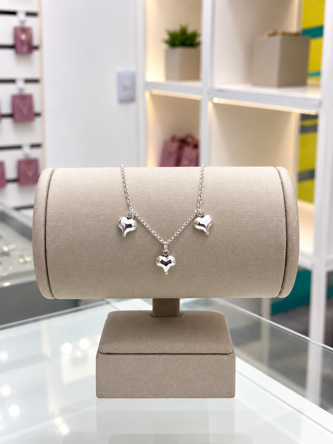 Pulseira três corações